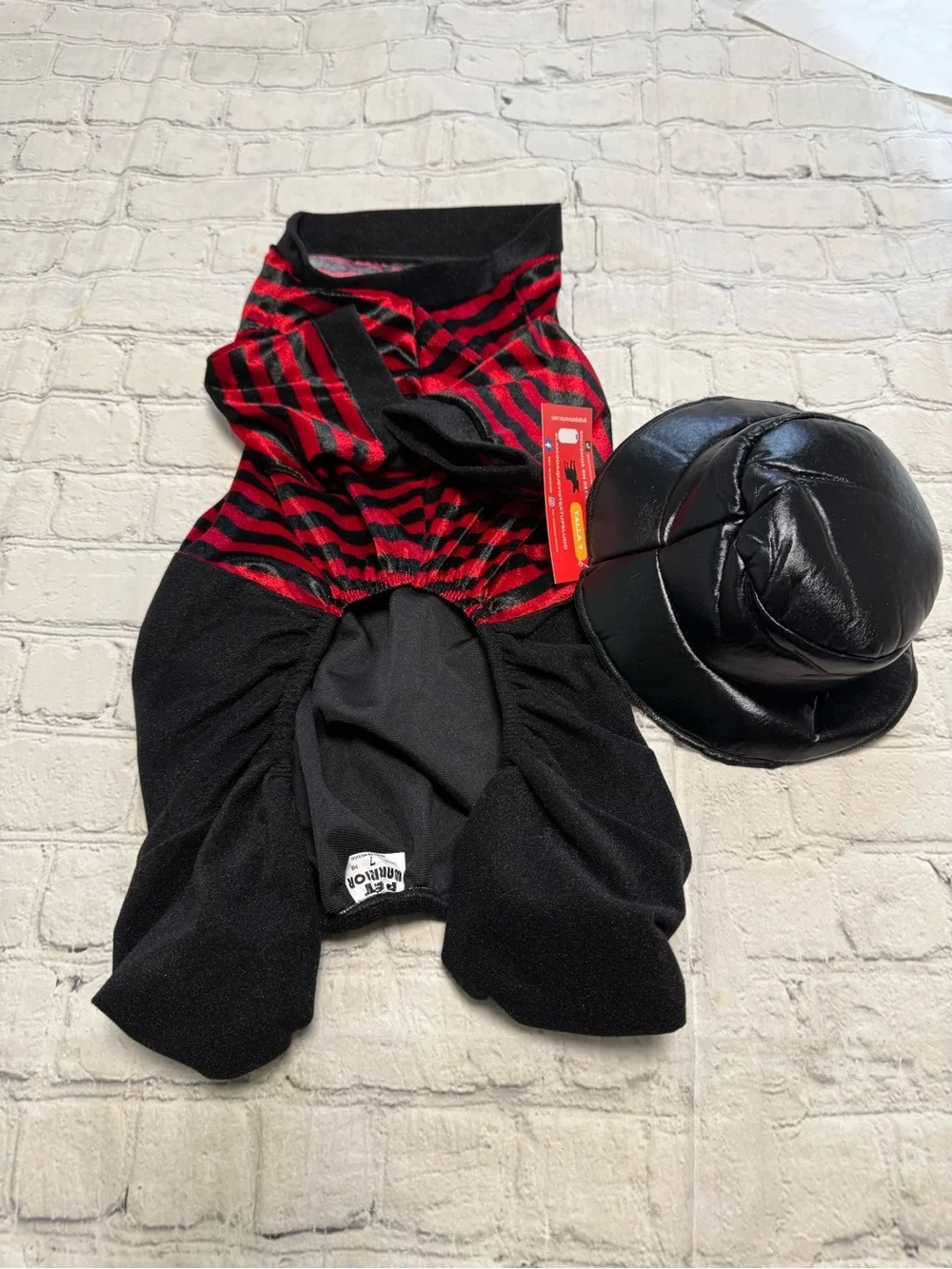 Pet Warrior Dog Striped Red & Black shirt and black pants custome. Halloween co